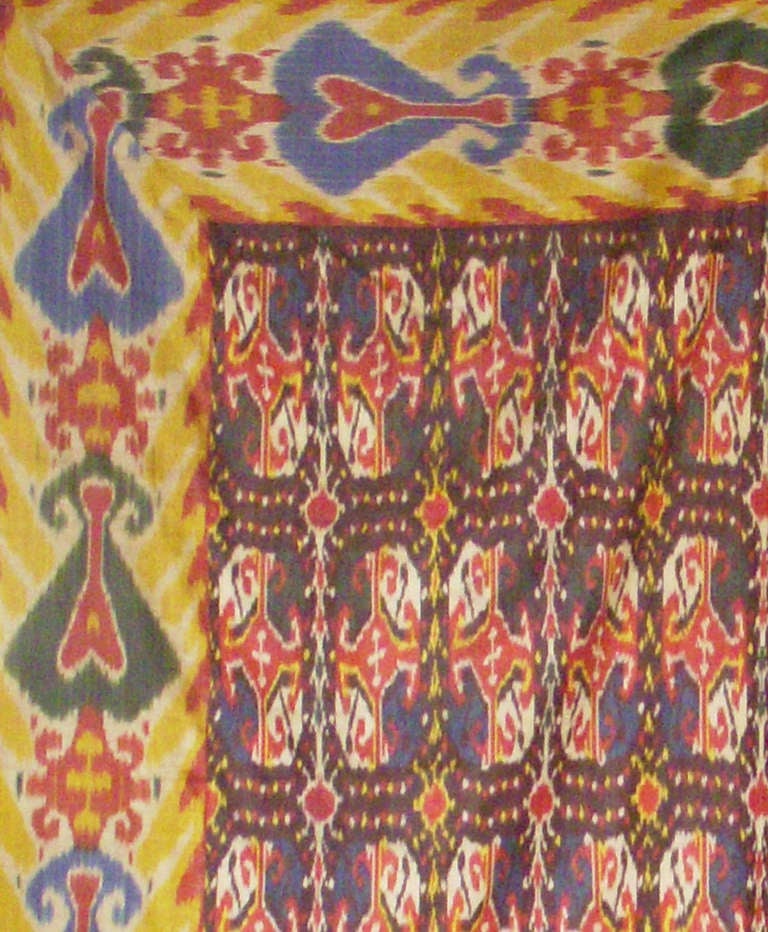 A fabulous Antique Silk Ikat; vibrant yellows, reds, greens and blues; 19th Century; Uzbekistan.
105