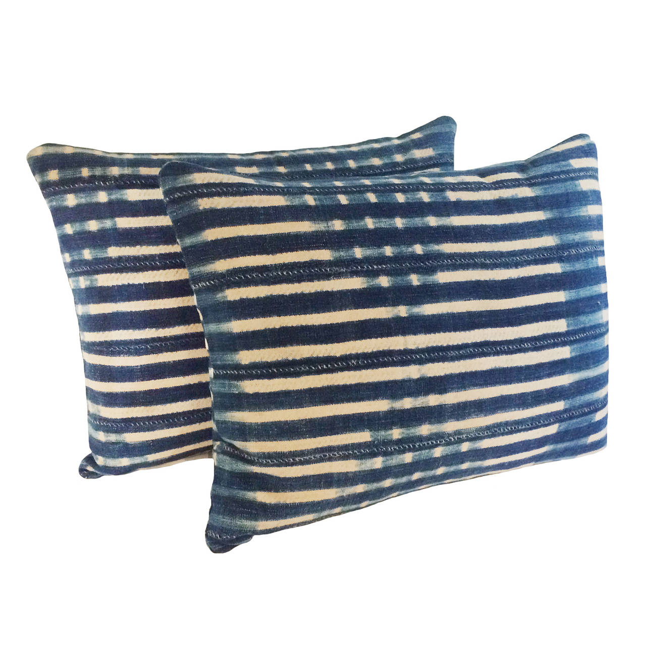 A pair of pale blue and white striped African Batik Pillows; 19th Century.  Vintage textile on both sides.