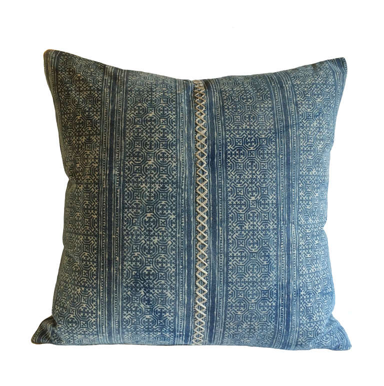 Pair of vintage pale blue indigo batik down pillows with center stitch detail; 19th Century.
