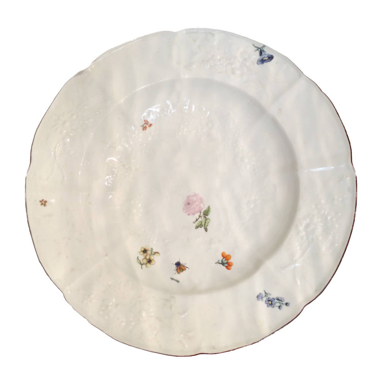 Set of six Chelsea botanical plates; soft paste porcelain; embossed decoration; scalloped rim, circa 1750. Sold as a set.