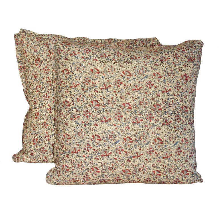 Sumptuous custom hand blocked cotton Indian down pillows; beige, blue, red.  Fabric is on both sides with a nicely detailed flange along the border; Mid-Century.