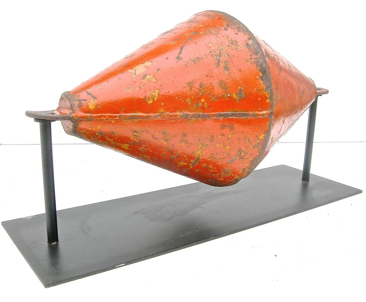 Highly graphic, vintage, marine buoy having an extremely eye-catching orange color palette with an architecturally pleasing shape and form. Time worn and weathered overall surface and patina. Custom Stand.