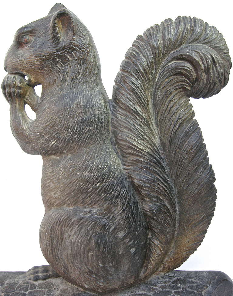 A handsome early, cast iron doorstop of a foraging squirrel motif. Having incredible life-like casting and detailing. Attributed to the iconic Bradley and Hubbard Company.