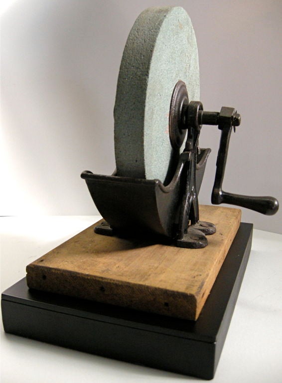 antique hand crank grinding wheel