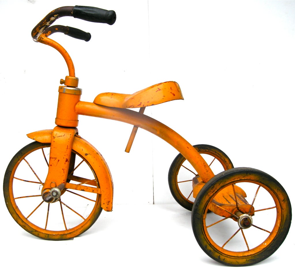 A high style ride, just in time for spring, in a vibrantly appealing, probably custom ordered, overall tangerine color palette.  Lovingly time worn and weathered by Joyce.