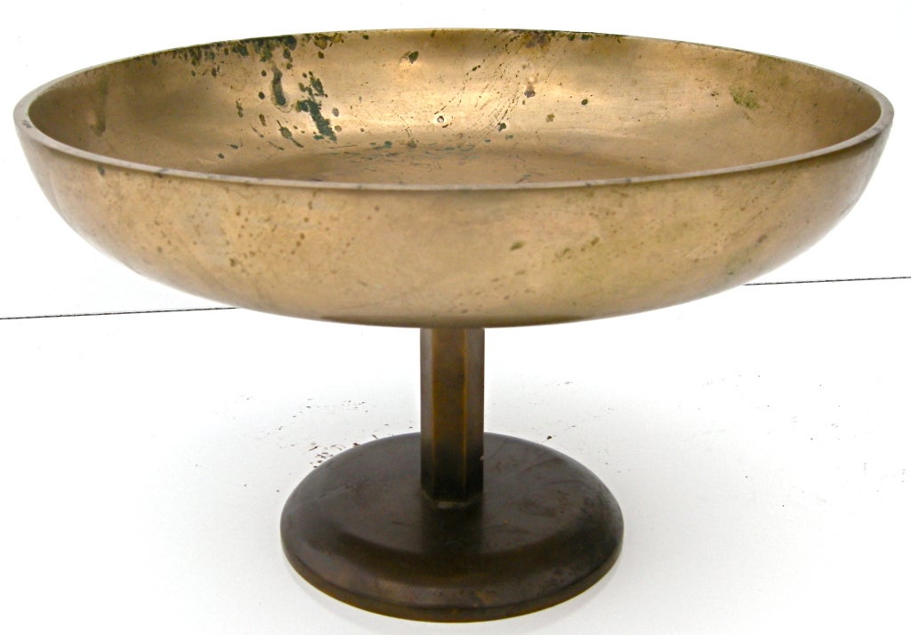 An elegantly simple compote of hand crafted solid brass/bronze. A subtle and handsome decorative adornment. Nice mellow, overall time worn and weathered surface patina.