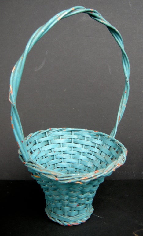 A simple trio of vintage, petite floral baskets in soft pastel color palettes. Less is more.