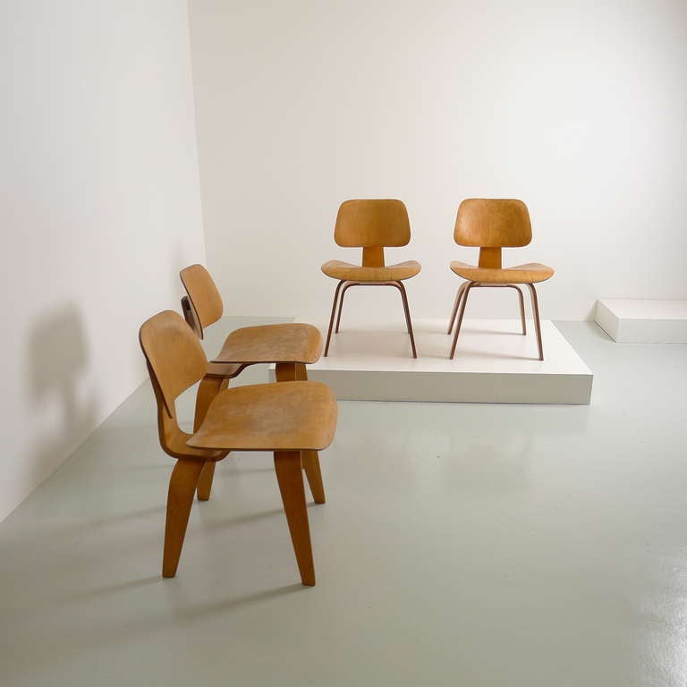 Charles and Ray Eames for Evans plywood an original set of 1948 Dining Chairs with labels to underside of each example .

Re-glued shockmounts , factory done  to two chairs , minor chips to lower legs , structurally sound .