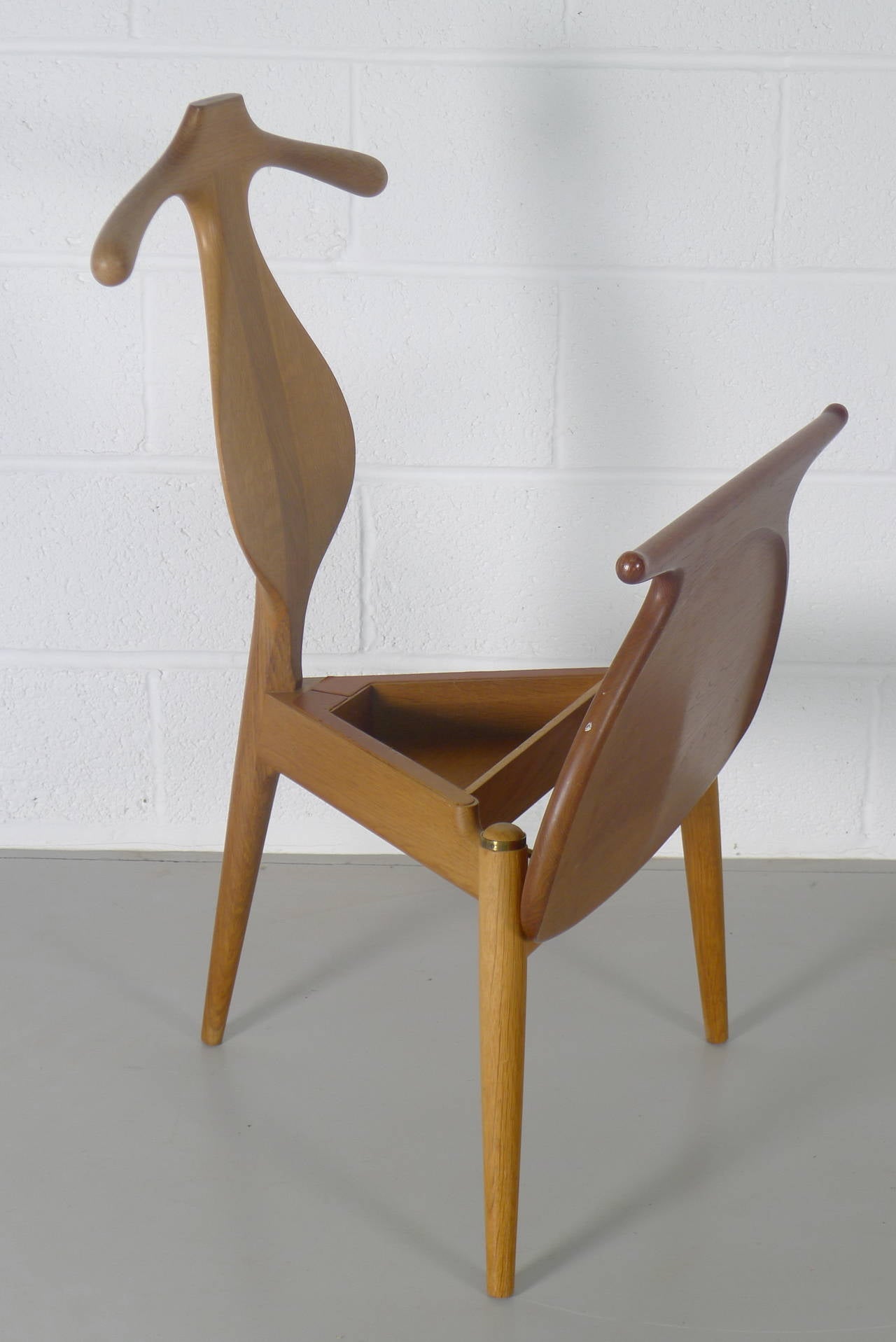 Hans Wegner for Johannes Hansen, Denmark, 1953. Teak seat and oak framework, signed with braised makers mark to underside. Fabulous example in perfect vintage condition.
