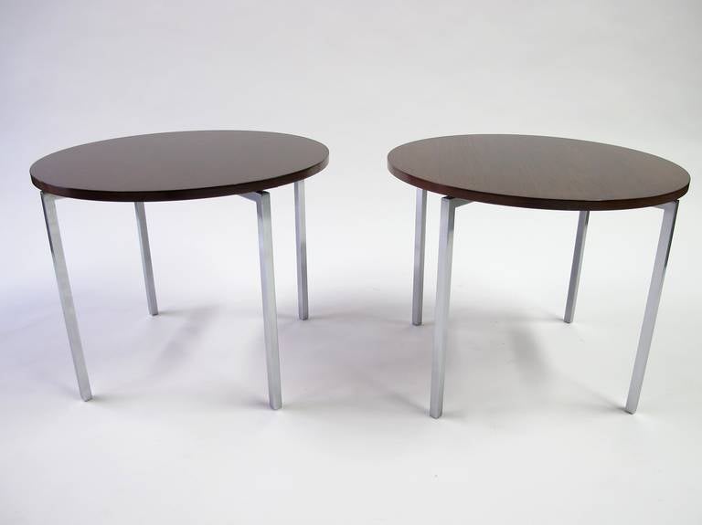 Florence Knoll side tables with Walnut tops and stainless steel legs.  A great set of tables for the bedside or sofa. Offered as a pair.
