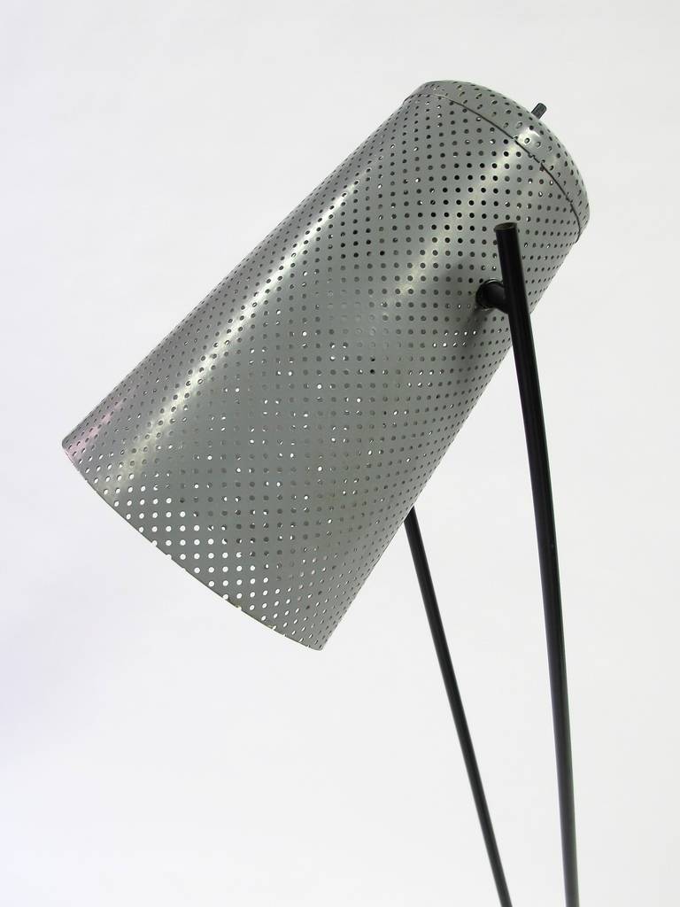 One of a small group of Lamps designed by Ben Seibel in the 1950s. The shade adjusts on a pivoting ball joint.