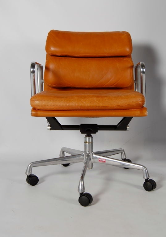 Charles and Ray Eames for Herman Miller , soft pad chair with amazing toffee coloured leather , tilt with limiiter, height adjustment and swivel . Labeled as from the American Institute of Architects . The chair is in stunning condition with none of