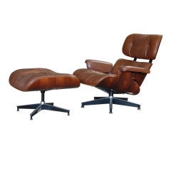 CHARLES AND RAY EAMES LOUNGE CHAIR AND OTTOMAN