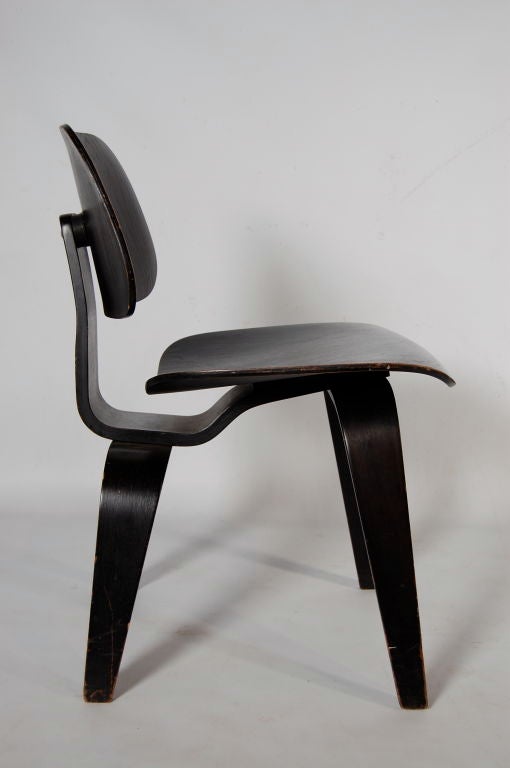 CHARLES EAMES ; ORIGINAL DCW WITH FIRST EVANS LABEL 1
