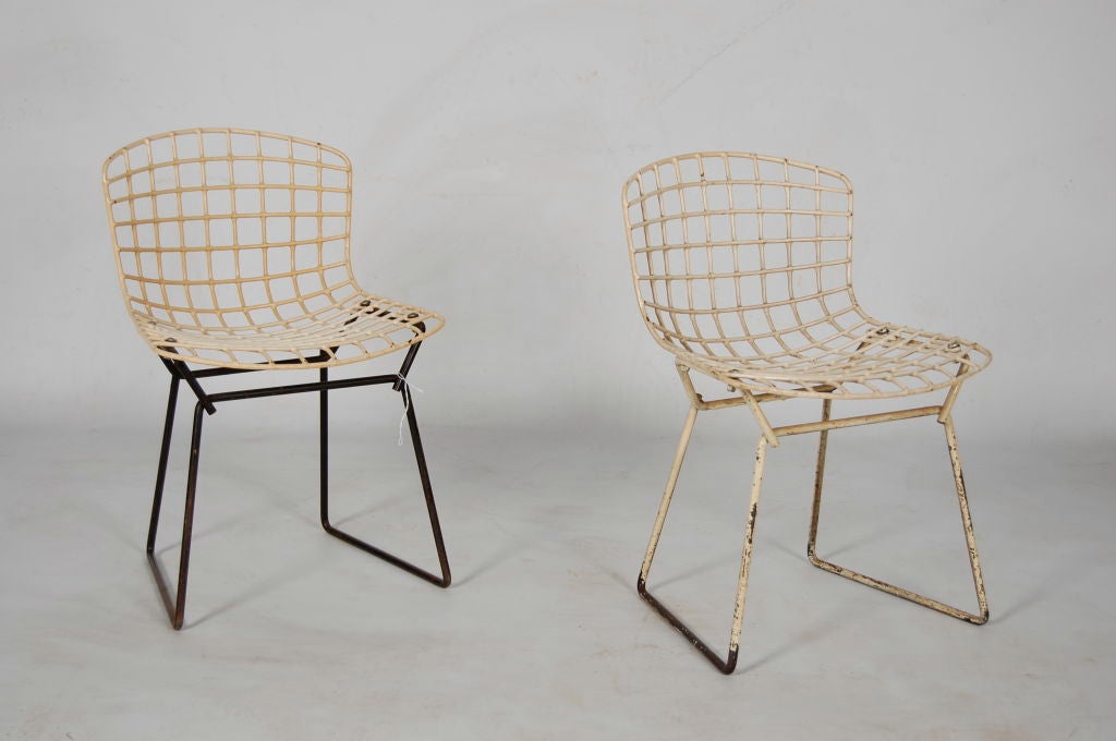 Harry Bertoia for Knoll , pair of vintage childs chairs , one with black base one with well worn white base .Priced for the pair .