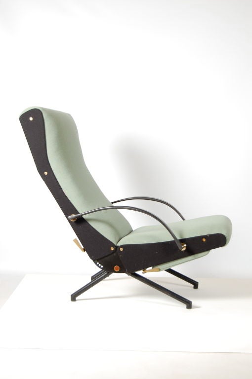 An Osvalso Borsani P40 chair for Tecno , Italy . This highly adaptable chair can be used in any of 486 different positions . The front legs have very early labels , and it has the Tecno logo each side . The legs are the more desirable early rounded