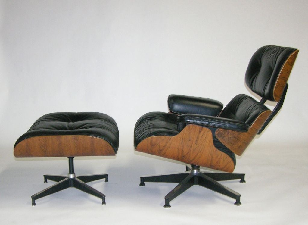 Eames Lounge Chair and Ottoman with black leather cushions and   Rosewood frame.<br />
Designed in 1956 the example was produced in the 1970’s.<br />
Signed with Herman Miller Label.<br />
<br />
Located in the New York Warehouse.