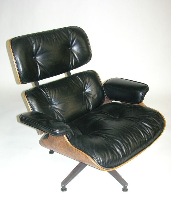 Leather Eames Lounge Chair and Ottoman produced by Herman Miller
