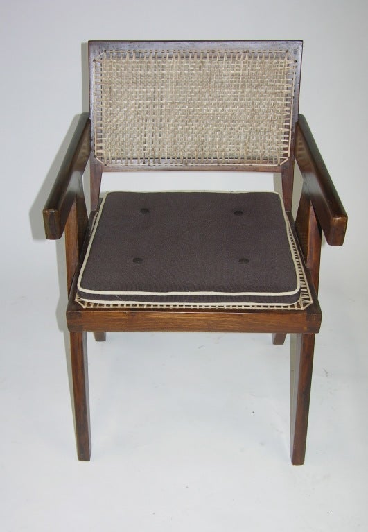 A Pierre Jeanneret dining height teak and wicker 
