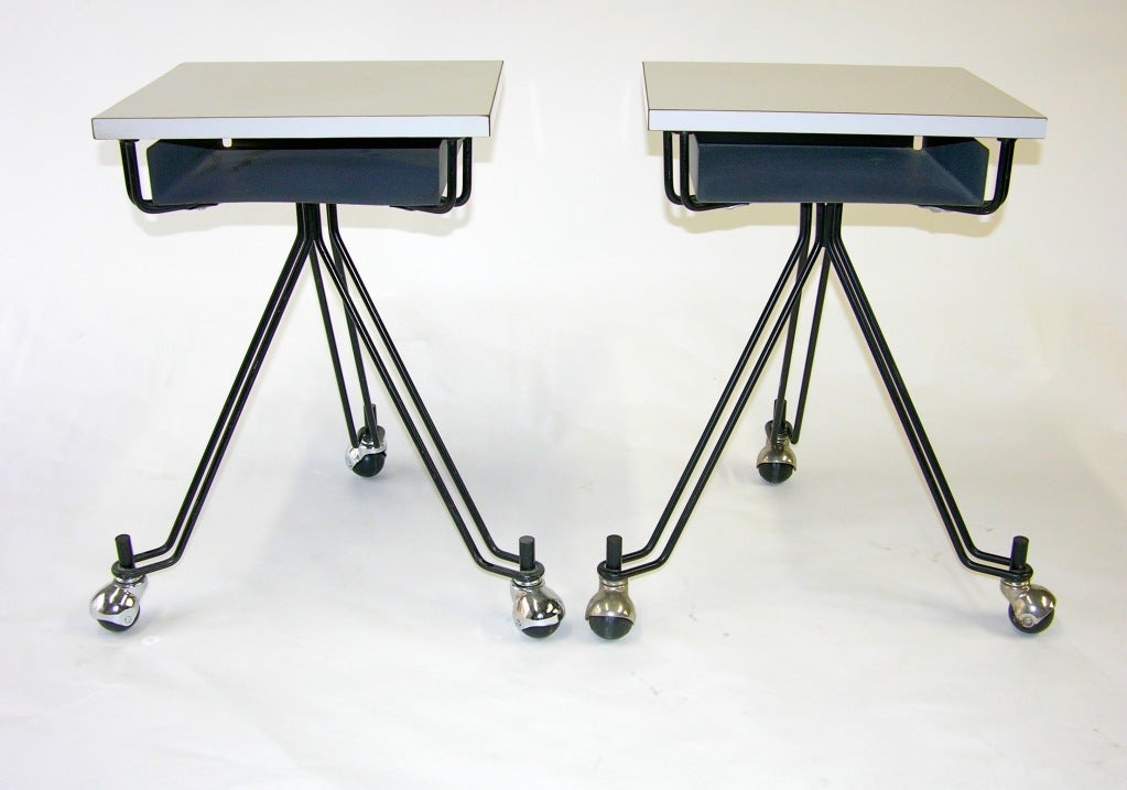 William Plumb of the Eliot Noyes office designed the IBM Dictating Machine Stands. These examples feature White Formica tops and a tripod base. The Museum of Modern Art has a similar example in their permanent collection.  This form works well for