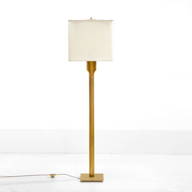 French gilt metal Floor Lamp in the manner of Maison Jansen with bespoke parchment shade.