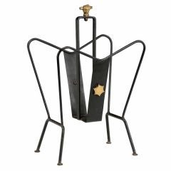 Lacquered metal magazine rack by Jacques Adnet