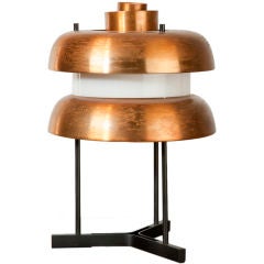 Lacquered metal and brass 'pagoda' style lamp.
