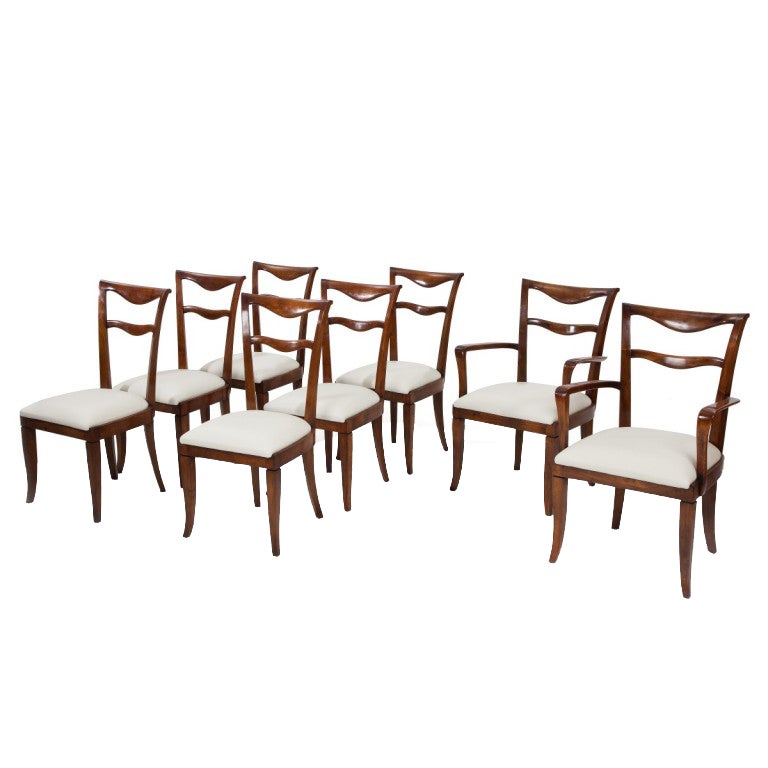 Set of six dining chairs and two carvers by Maurizio Tempestini For Sale