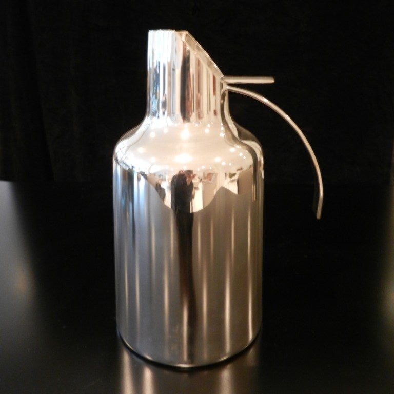 Elegant silver plated water jug by Lino Sabattini. Signed.<br />
Lino Sabattini,was a leading designer of cutlery and tableware producing designs that are elegant and well made. In 1956 Gio Ponti, who rated his work highly, publicised Lino