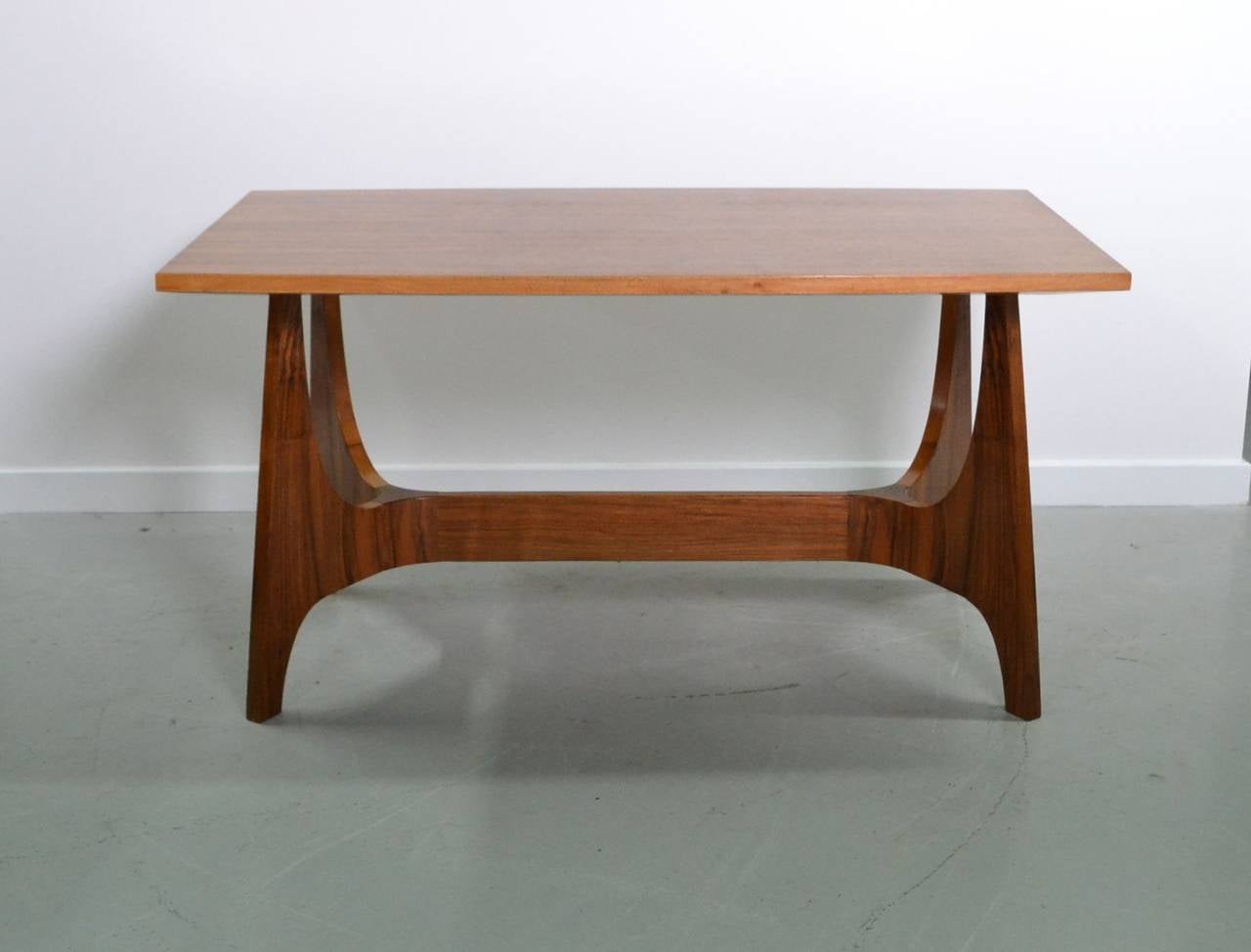 Walnut desk or table with organic form base.