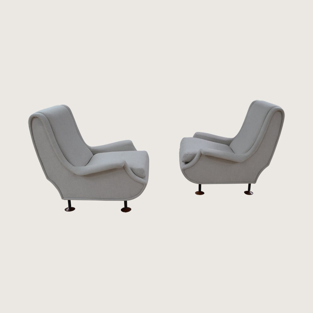 Pair of Regent armchairs with painted metal legs, wooden disc feet and
re-upholstery in a Kvadrat wool.
Designed by Marco Zanuso and manufactured by Arflex ,Italy.