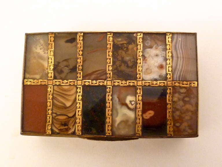 An incredibly unusual, exquisite Italian specimen agate and quartz box. Decorated all over with beautifully engraved gilt bronze mounts c.1800.