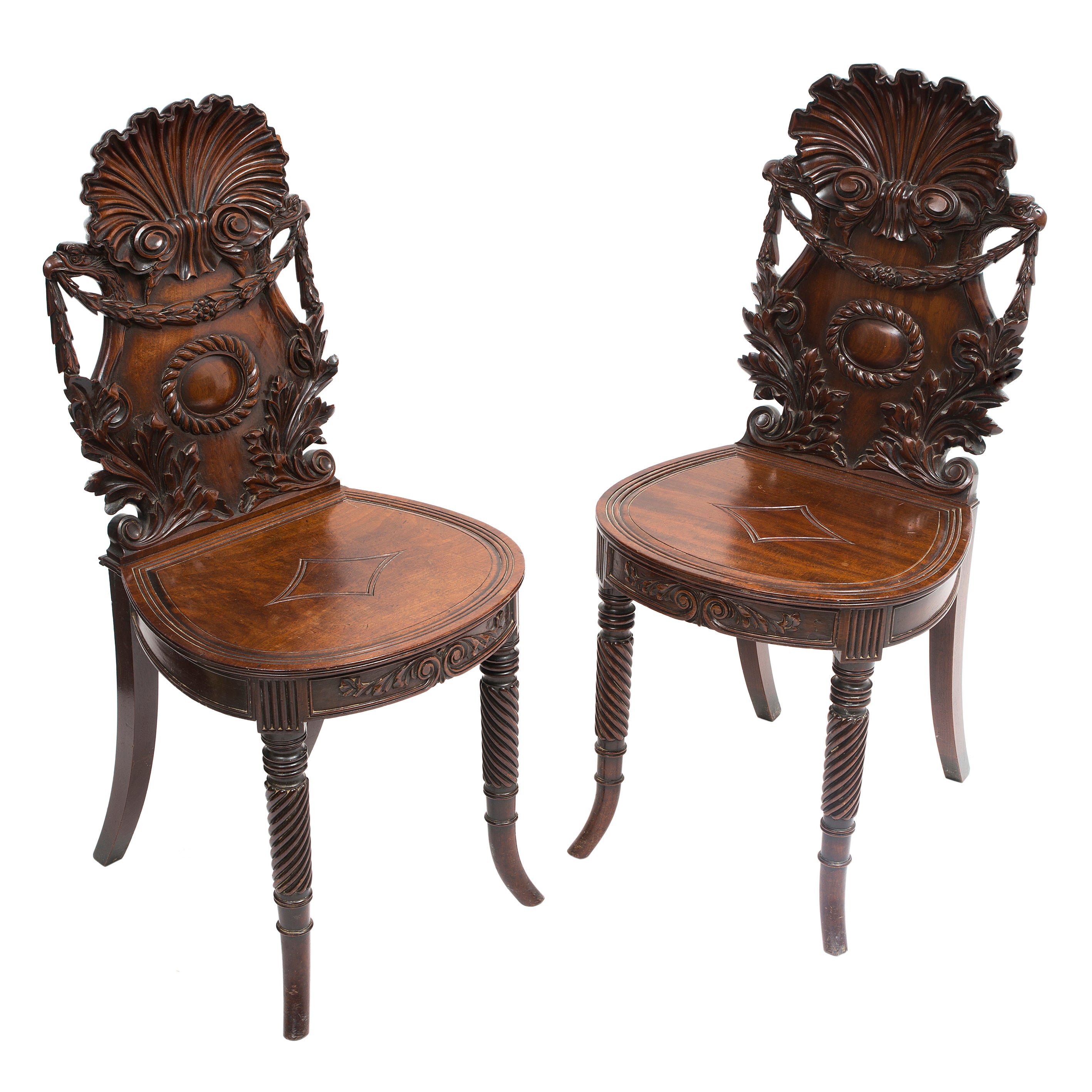 Pair Irish 19thC  Highly Carved Mahogany Hall Chairs with Shell Backs c1850