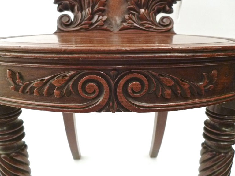 Pair Irish 19thC  Highly Carved Mahogany Hall Chairs with Shell Backs c1850 1