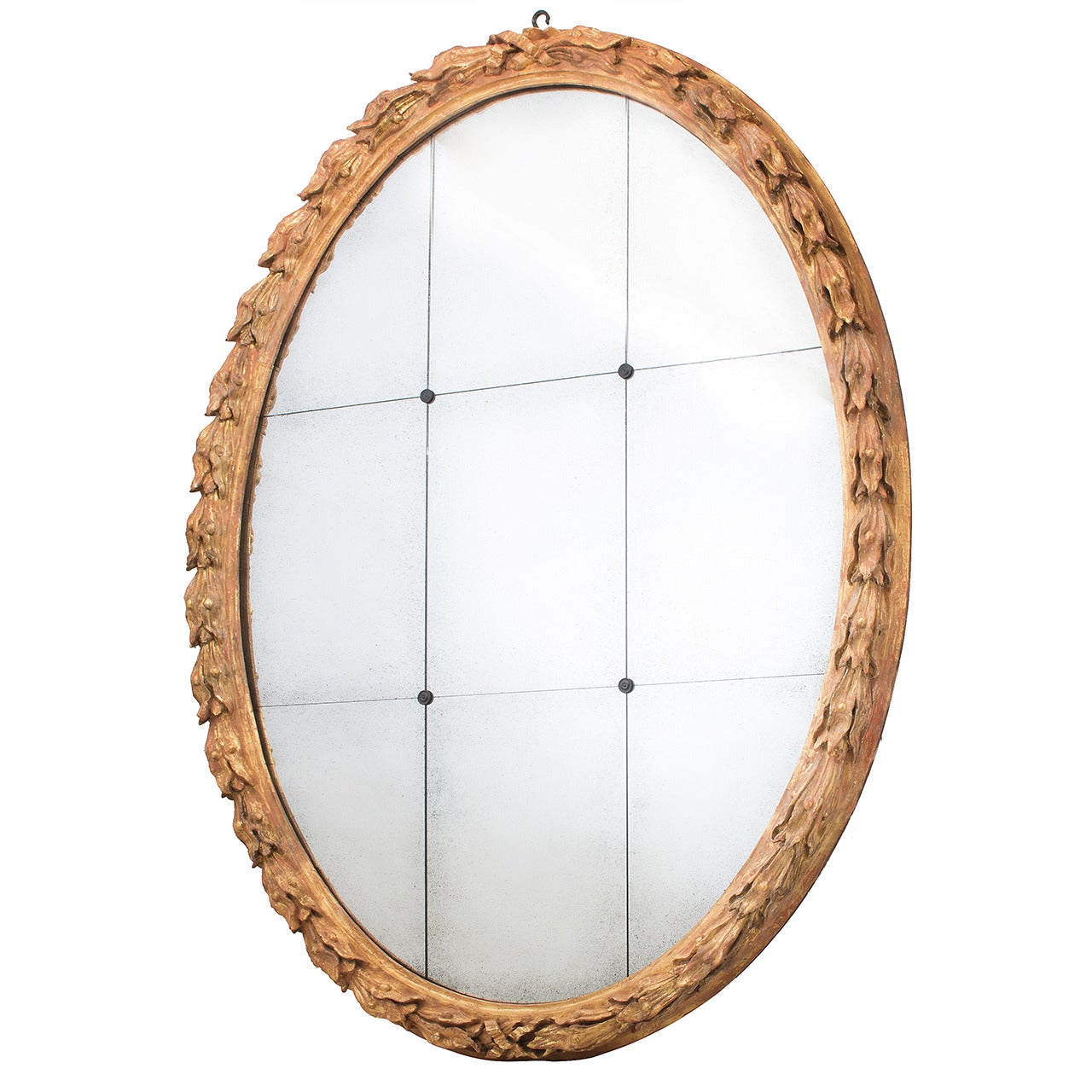 Monumental Tuscan Oval Carved Giltwood Framed Mirror, circa 1700