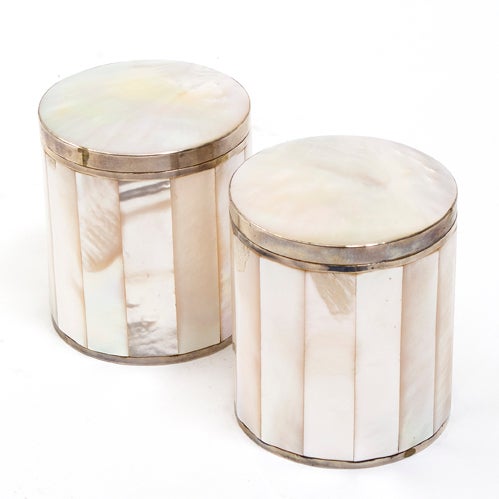 Pair Chinese Mother of Pearl Boxes. The facetted sides joined at the base and rim by silver bands, and with domed tops.