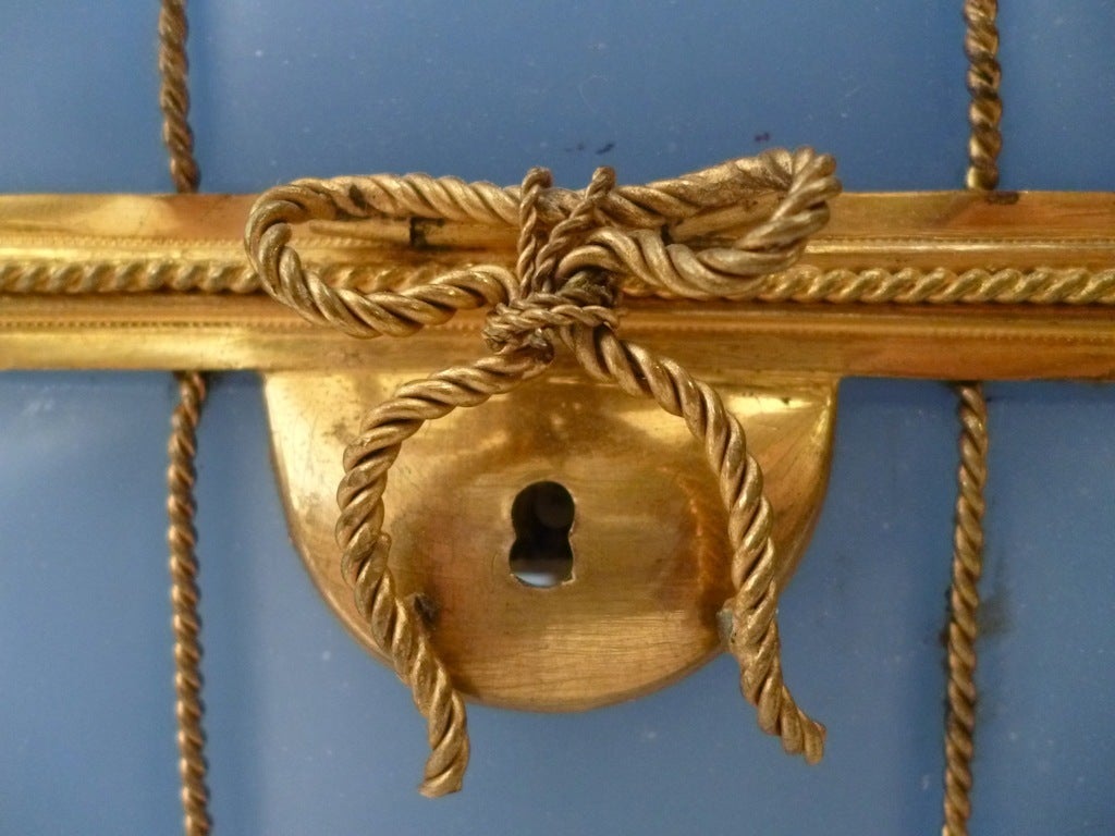 Unusual Bohemian pale blue glass casket with gilt mounts in the form of a bale, containing two fitted scent bottles.