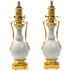 Pair of French Gilt Bronze and Celadon Porcelain Double Gourd Lamps, circa 1900