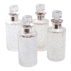 Set of 4 American Silver Mounted Cut Crystal Decanters