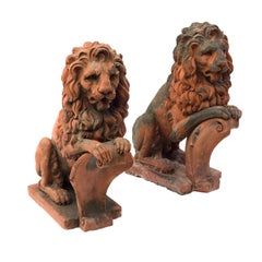 Pair of French Terracotta "Lions Sejant-Rampant" ca. 1850