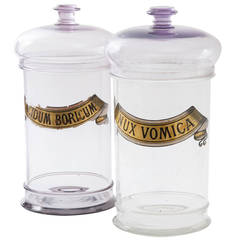 Pair of Large French Lavender Tinted Glass Pharmacy Jars and Covers, circa 1860