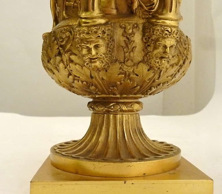 Finely cast and chased Grand Tour gilt bronze reduction of the famous Medici Vase. Of Campana form with detachable liner, gadrooned rim and a frieze depicting a continuous tableau of classical figures. The meaning of this scene is still debated, but