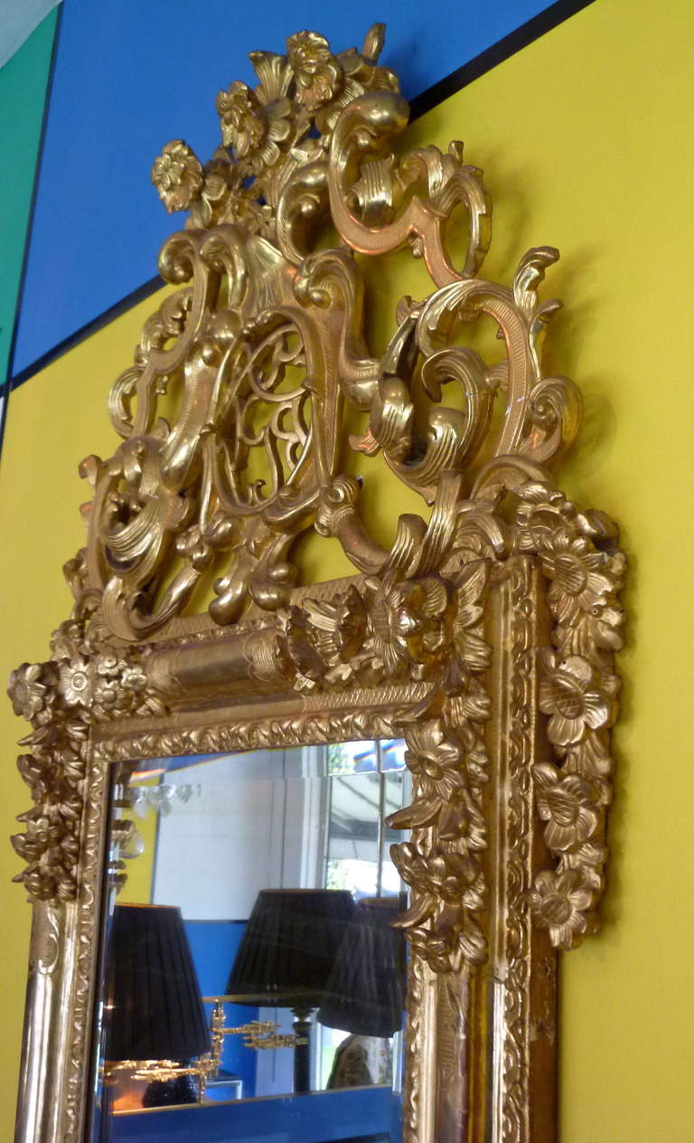 Carved Early 18th Century French Regence Gilt Wood Mirror