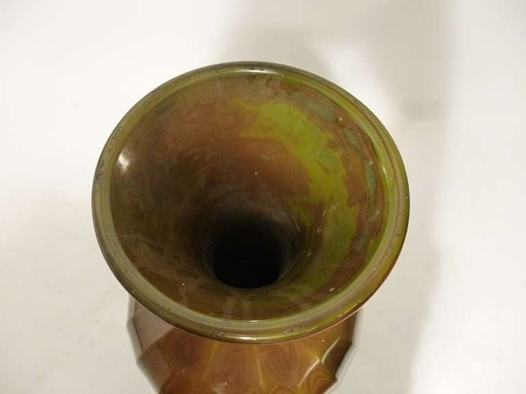 A fine Bohemian large Lithyalin glass baluster vase with faceted sides and circular, gadrooned gilt bronze base c.1860.

In 1828, the Bohemian glass maker Friedrich Egermann (1777-1864) invented Lithyalin glass, which simulates agate and jasper -