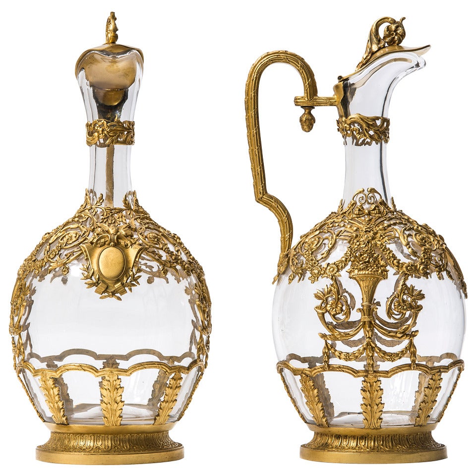 Pair of French Neoclassical Ormolu Mounted Glass Claret Jugs, circa 1900