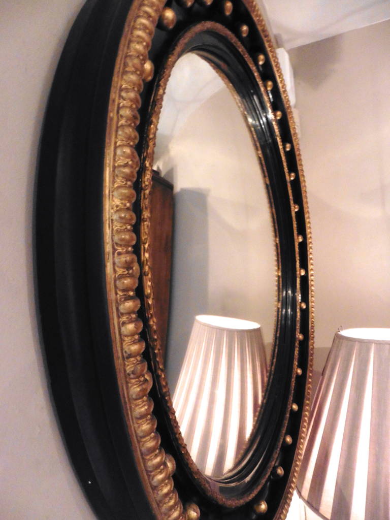 19th Century English Early Victorian Large Parcel Gilt Convex Mirror, circa 1850