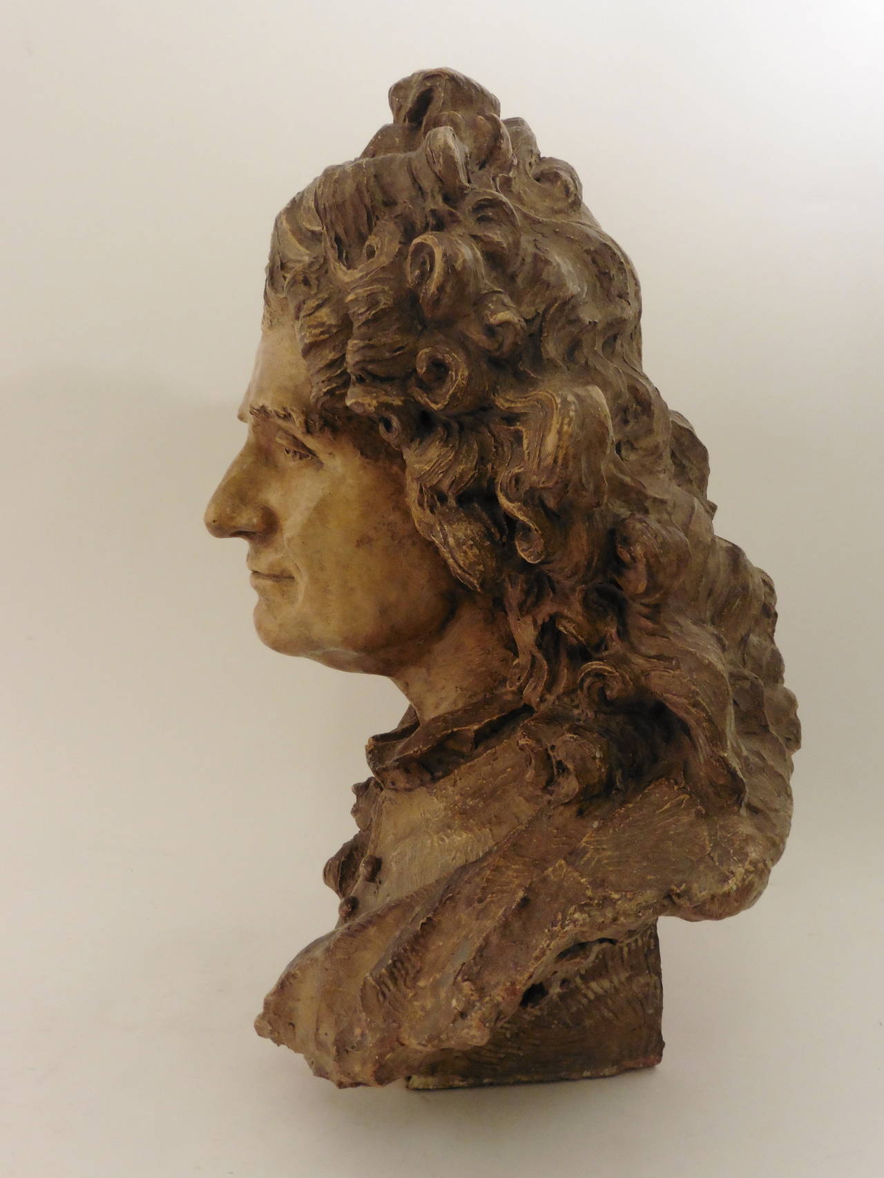 A fine French Louis XVI large terracotta bust of a nobleman, thought to be Jean La Fontaine c1780.