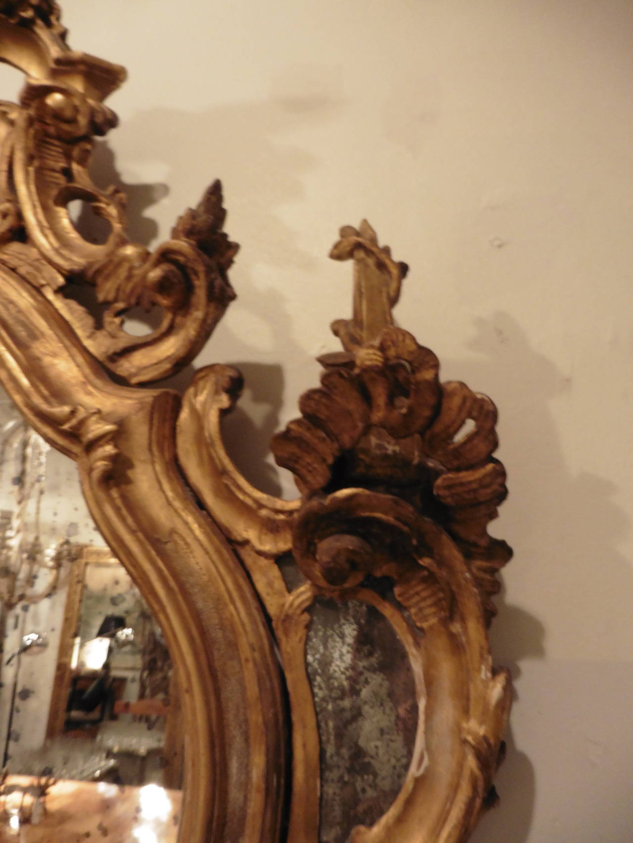 Italian Pair of Venetian Giltwood Mirrors with Glass Candleholders, circa 1750
