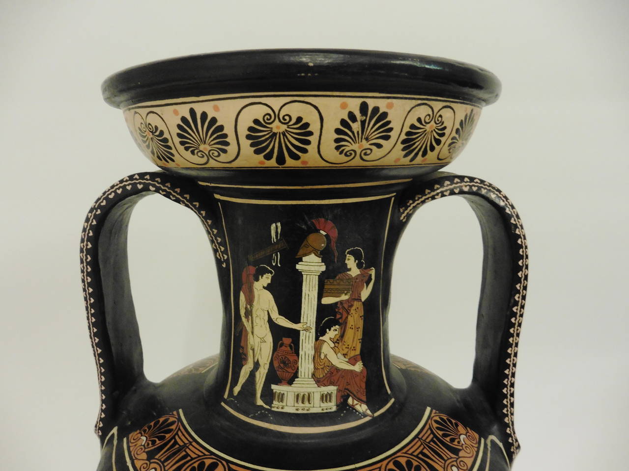 A large and highly decorative terracotta Amphora vase, after the antique. The base bearing an inscription detailing the beautifully painted scenes by the maker, Greek, circa 1950.