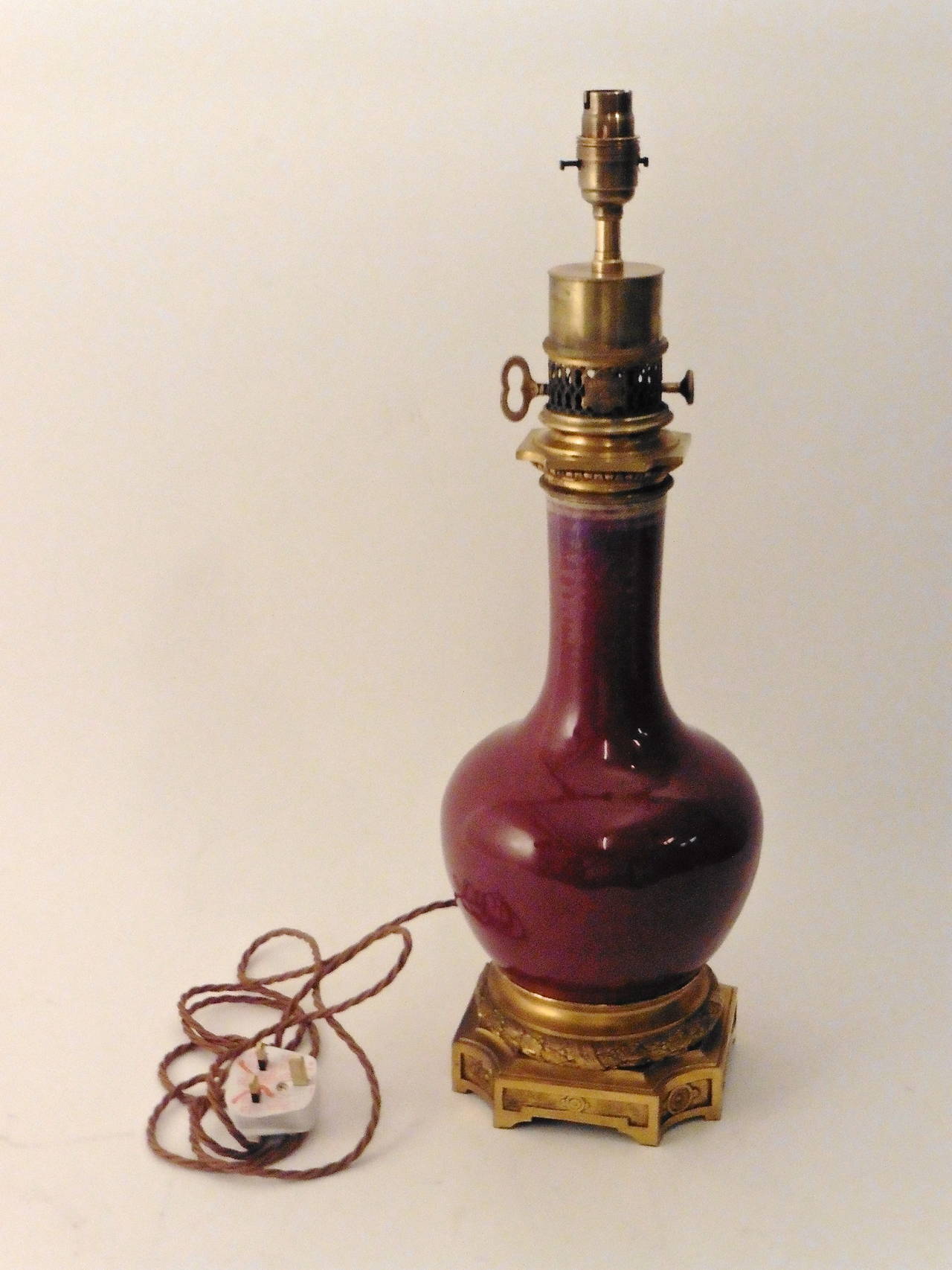Ormolu Pair of Bronze-Mounted Oxblood Vase Lamps by Gagneau of Paris, circa 1870